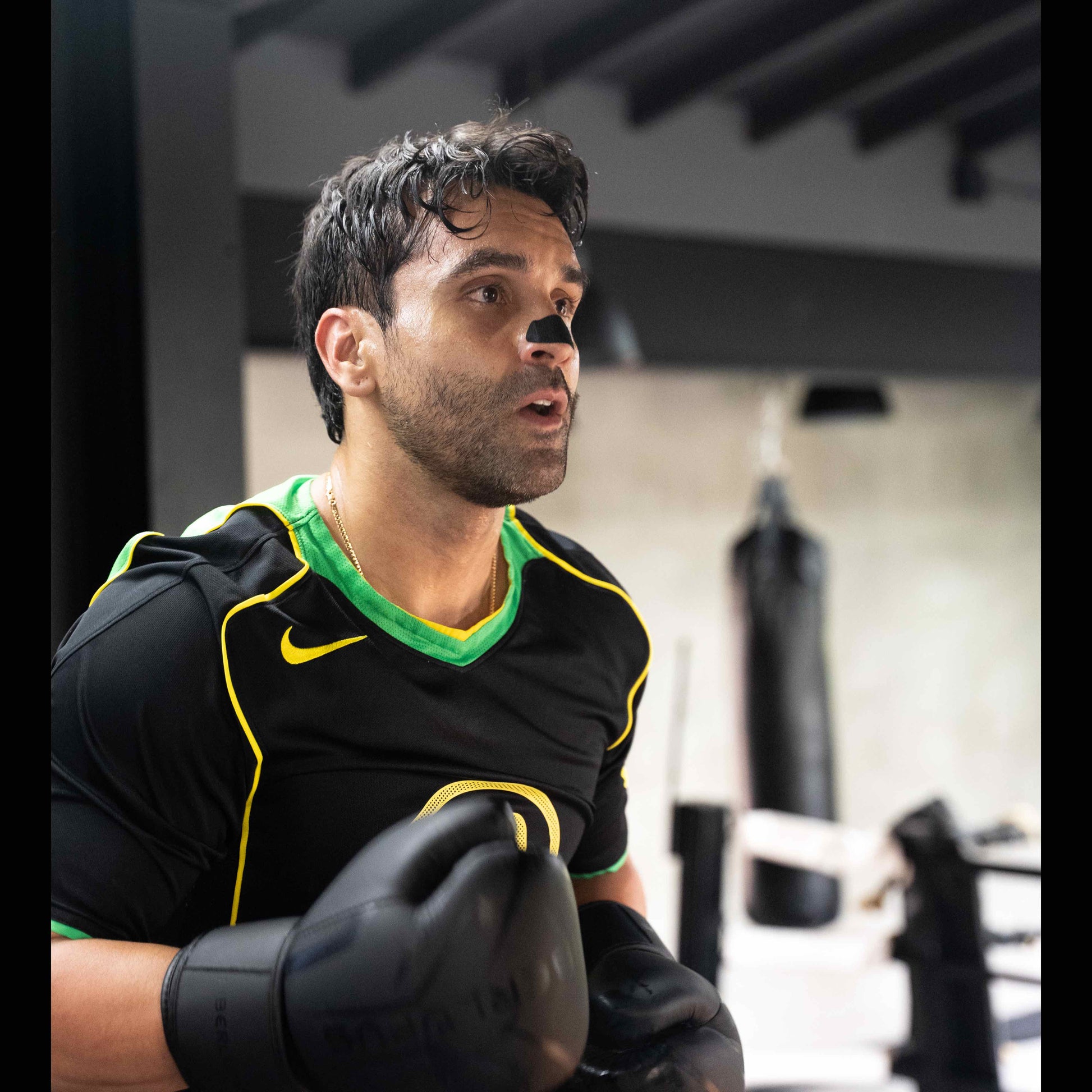 Complete Energy Kit — MOVE pillar — boxing athlete with Breathe-More nasal strip during high exertion