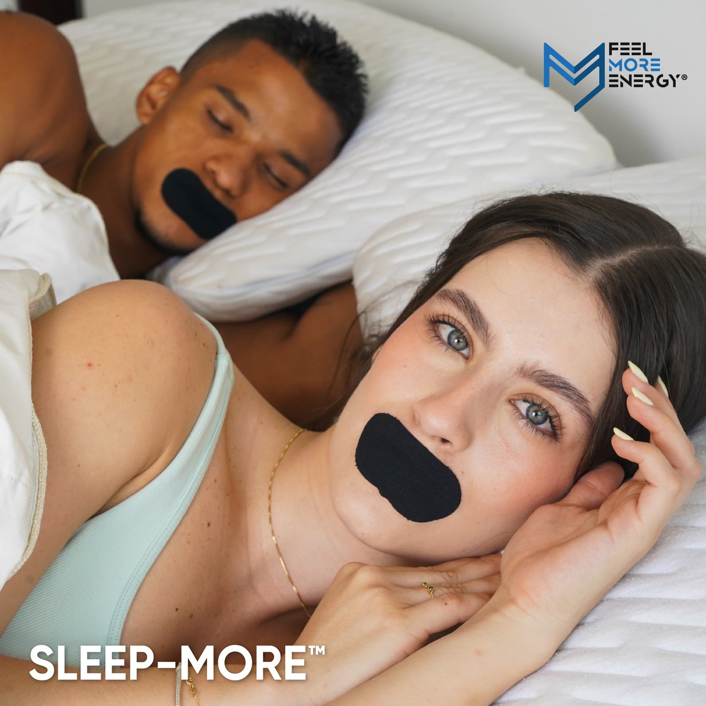 Two people lying in bed with 'Sleep-More' mouth strips on, featuring the brand logo.